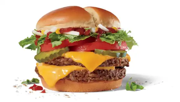 Double Jack Burger with lettuce, cheese, tomato, pickles, mustard, ketchup and onions.